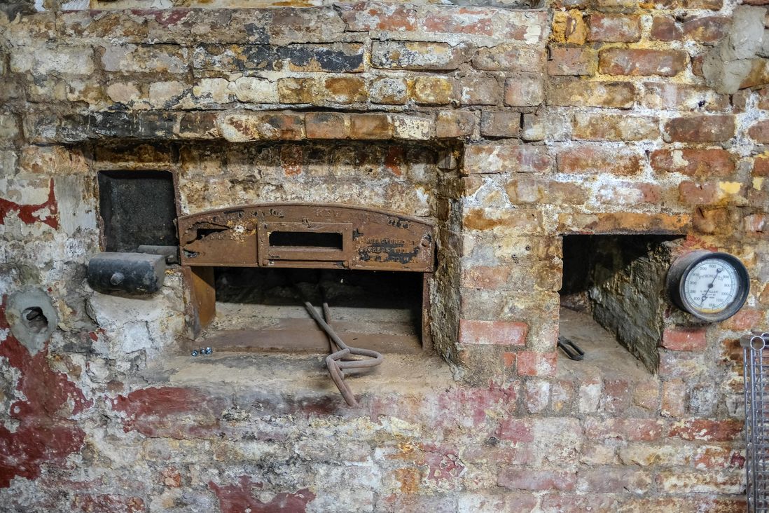One of two century-old coal ovens in the basement